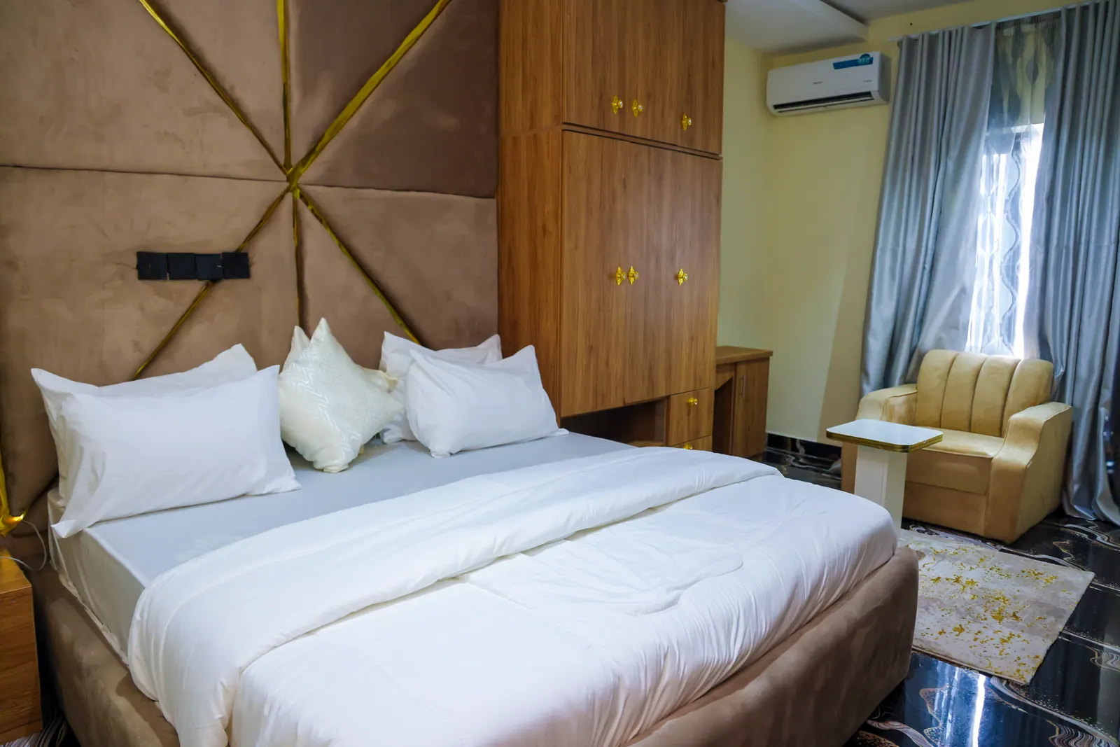 A Standard Room, made up with white linen